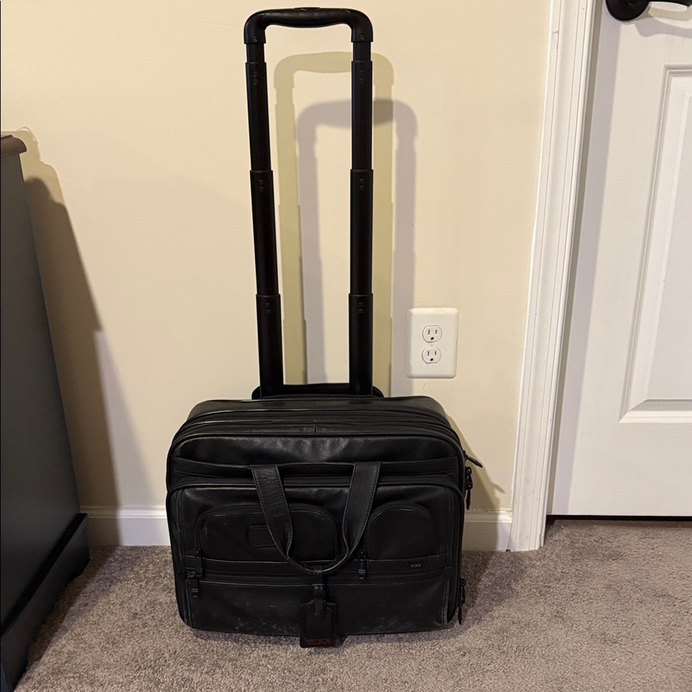 Black Tumi Rolling Laptop Bag